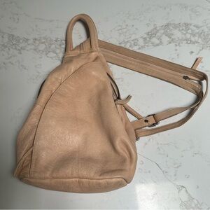 We The Free 9 x 13 Beige Leather Backpack. Priced for Gently used, some wear.